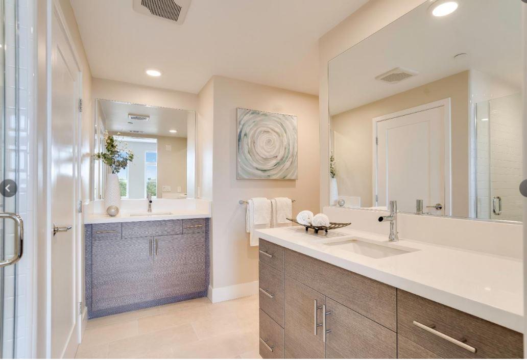 400 Mariners Island Boulevard, Unit 215 San Mateo, CA 94404 - Photo 12 of 29 a bathroom with a bathtub sink and mirror