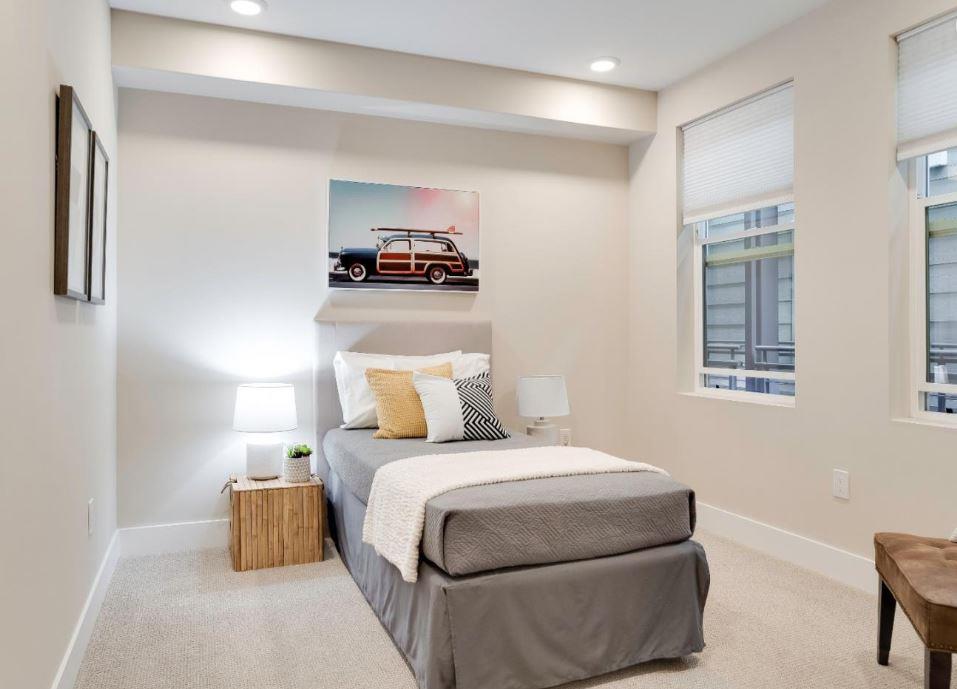 400 Mariners Island Boulevard, Unit 215 San Mateo, CA 94404 - Photo 14 of 29 a bedroom with a bed and a couch