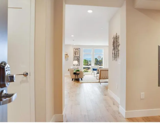 a kitchen with a sink stove and refrigerator