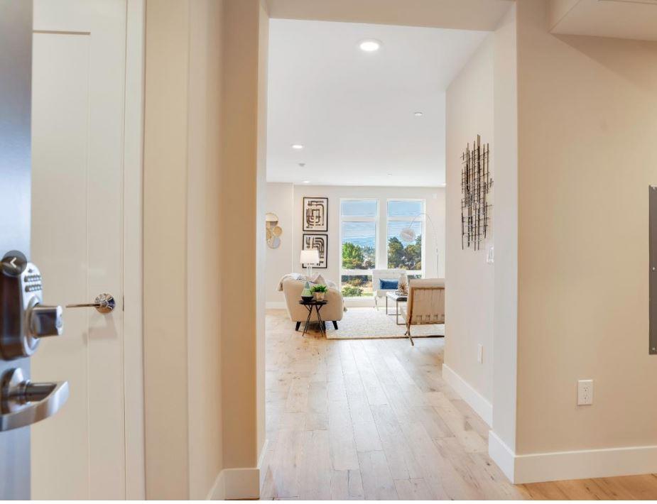 400 Mariners Island Boulevard, Unit 215 San Mateo, CA 94404 - Photo 2 of 29 a living room with furniture and a large window