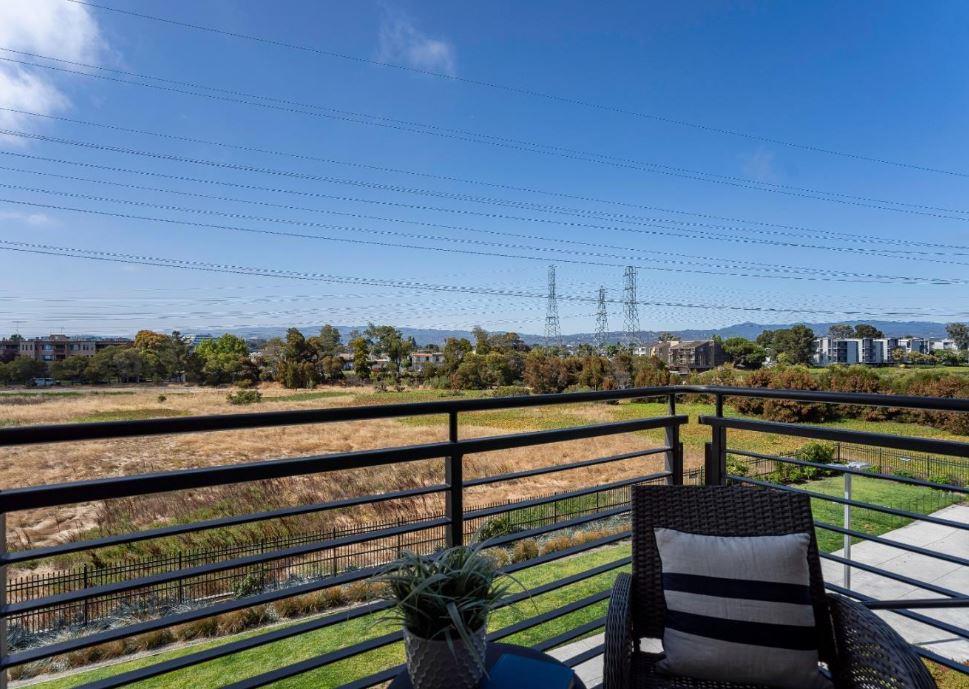 400 Mariners Island Boulevard, Unit 215 San Mateo, CA 94404 - Photo 7 of 29 a view of a chairs and table in the balcony