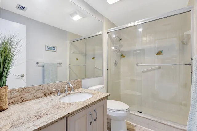 a balcony with furniture and garden view