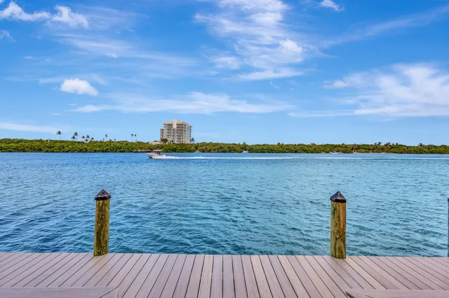 a view of lake with a yard