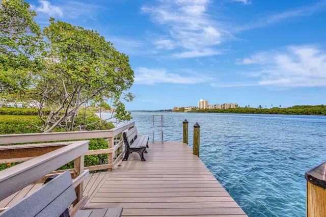 a view of a balcony with chairs