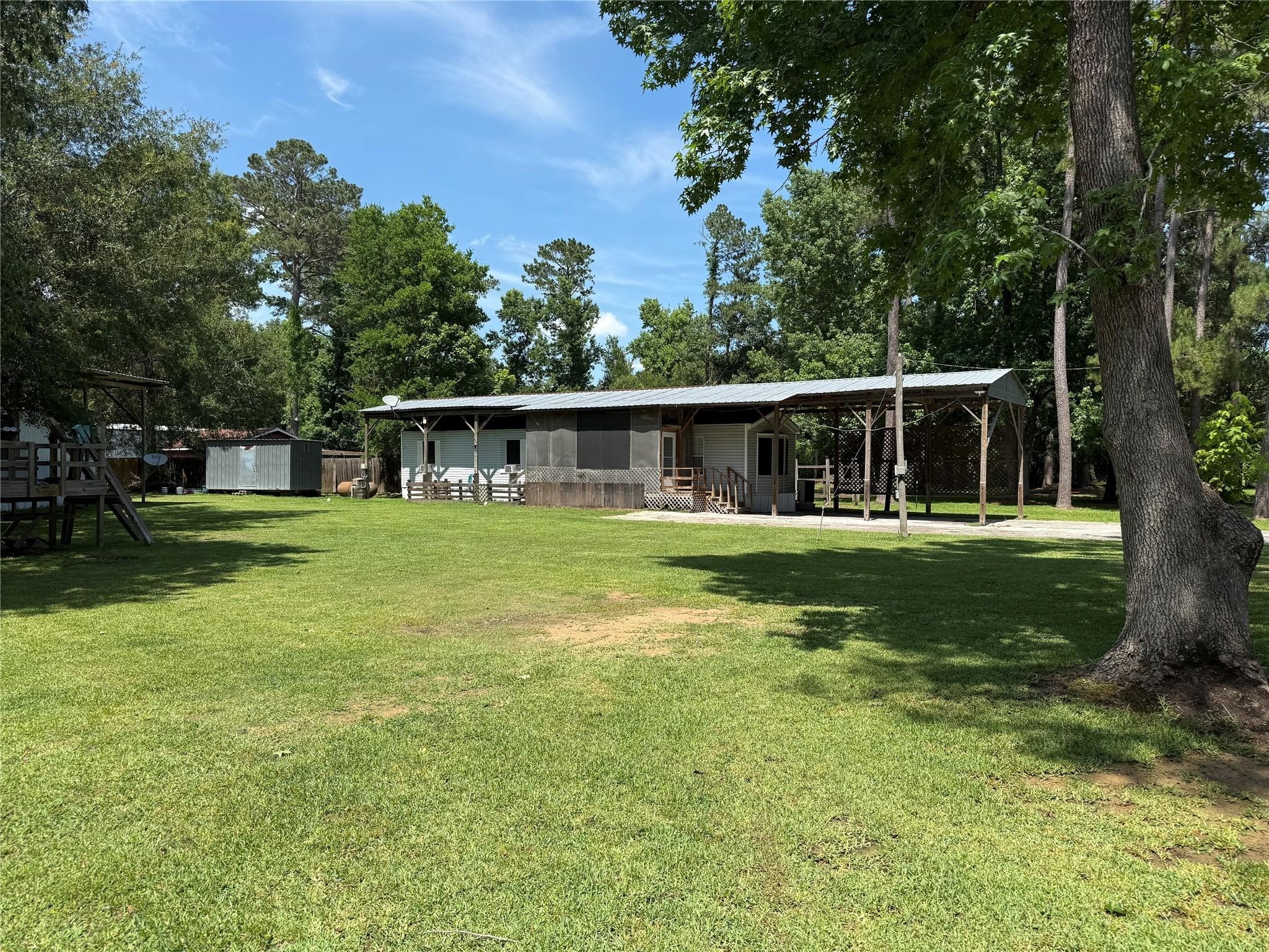 21326 Big Tree Drive Crosby, TX 77532 - Photo 1 of 19 a view of a house with a yard