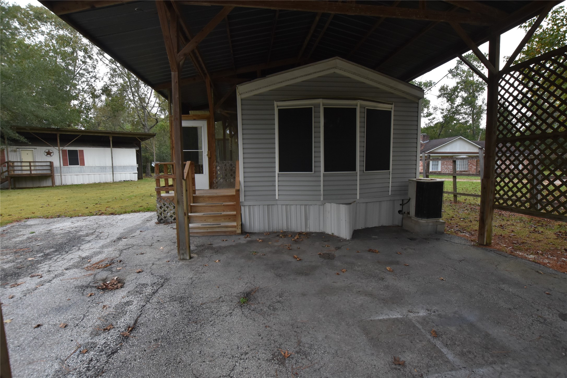 21326 Big Tree Drive Crosby, TX 77532 - Photo 17 of 19 a view of a house with a yard