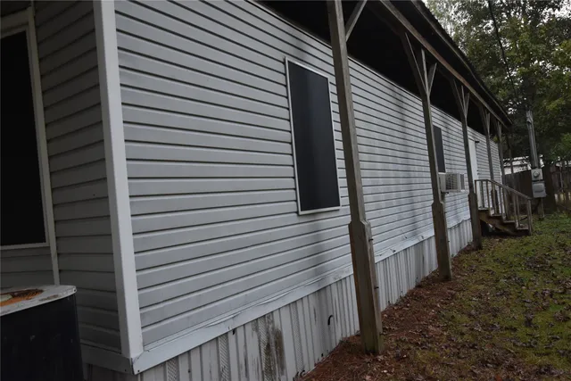 a view of a house with a street
