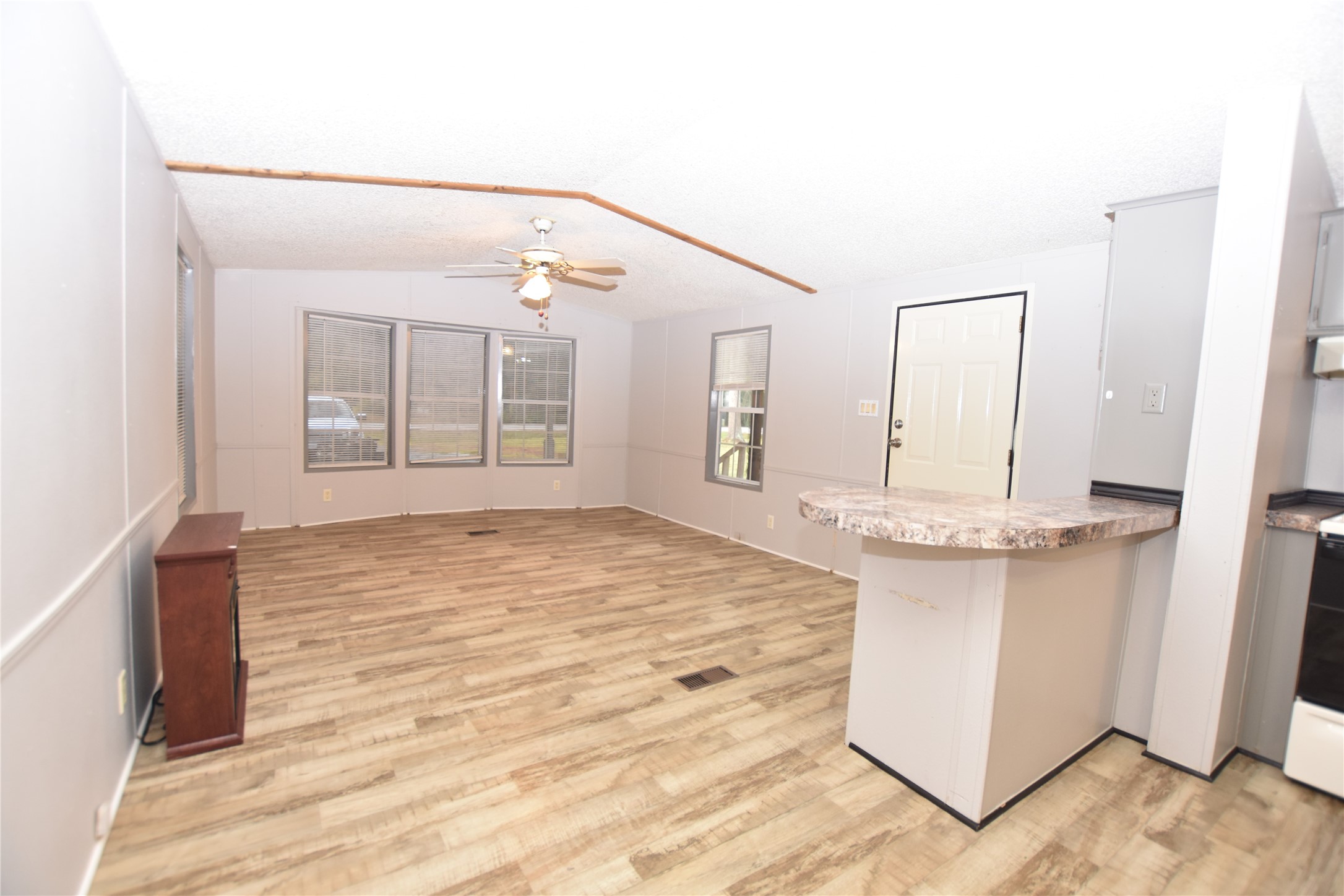 21326 Big Tree Drive Crosby, TX 77532 - Photo 5 of 19 a view of a kitchen cabinets and wooden floor