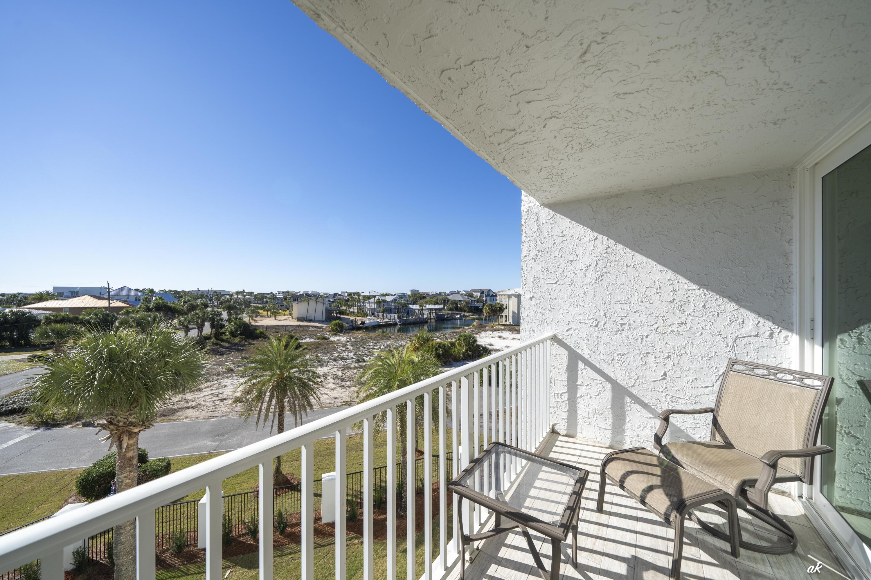 30 Moreno Point Road, Unit 404A Destin, FL 32541 - Photo 17 of 52 a view of a balcony with mountain view from a balcony