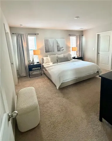 a workspace with furniture and a window