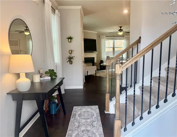 a living room with furniture fireplace and a flat screen tv