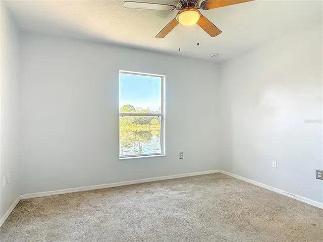 a view of a balcony with wooden floor