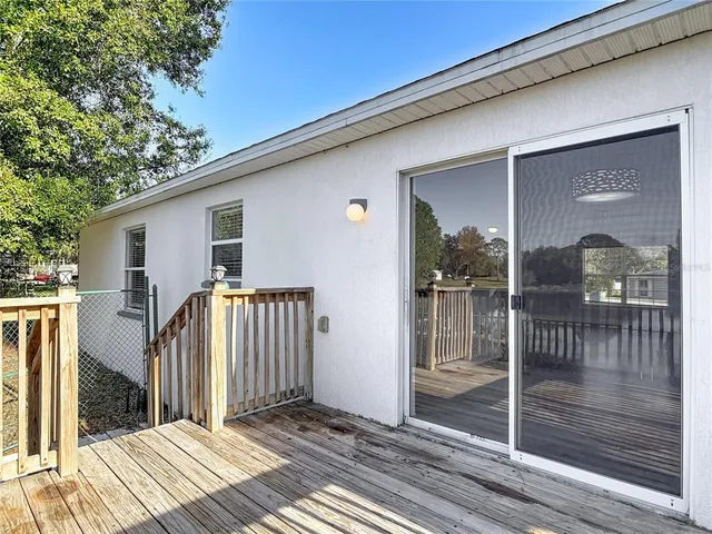 a view of a lake with a yard