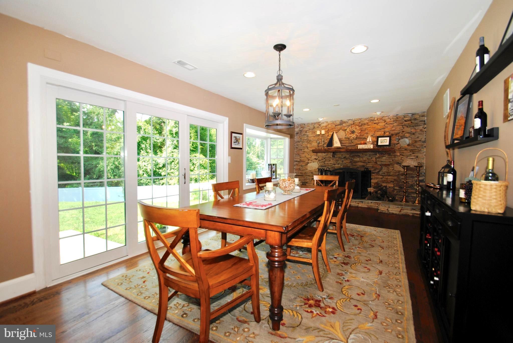 132 Church Road Arnold, MD 21012 - Photo 12 of 30 Dining / Family Room Spilling Out to Patio