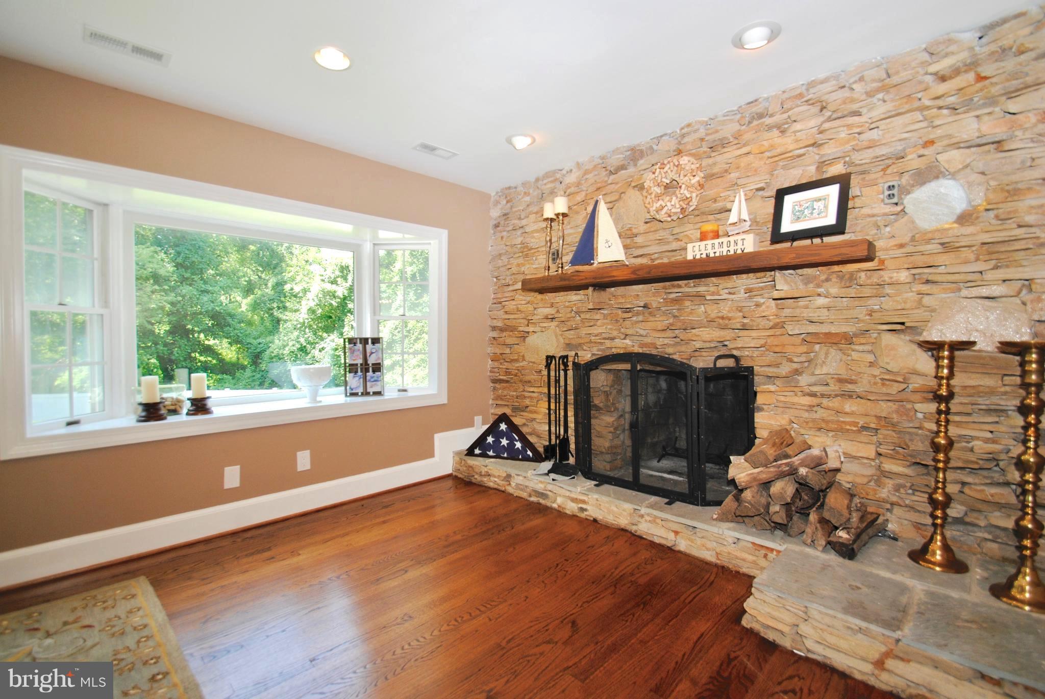 132 Church Road Arnold, MD 21012 - Photo 14 of 30 Brick Hearth Fireplace for Dining Ambiance