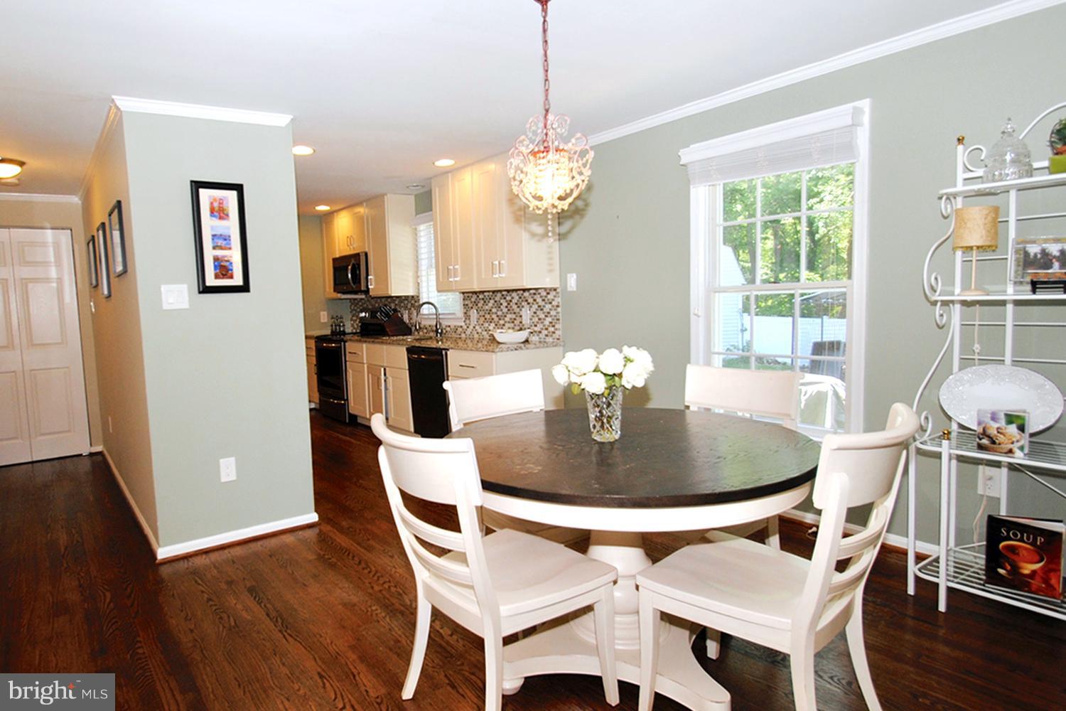132 Church Road Arnold, MD 21012 - Photo 17 of 30 Sunny Casual Dining Area Under Bistro Chandelier