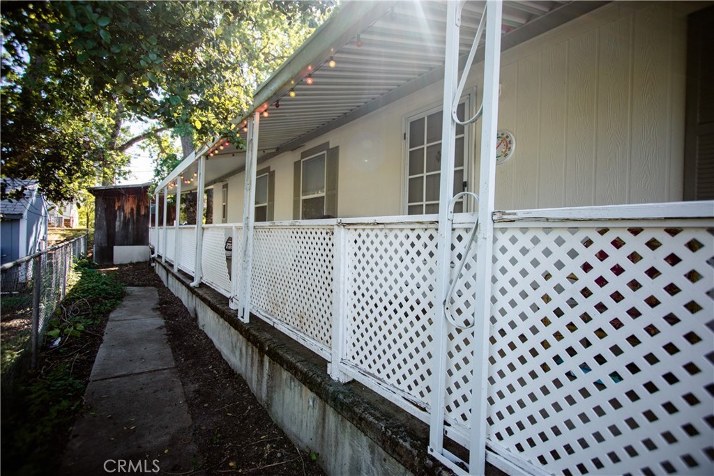 16390 Tish-A-Tang Road Lower Lake, CA 95457 - Photo 20 of 36 a view of a house with wooden fence