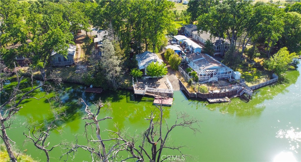 16390 Tish-A-Tang Road Lower Lake, CA 95457 - Photo 27 of 36 a aerial view of a house with swimming pool and lake view