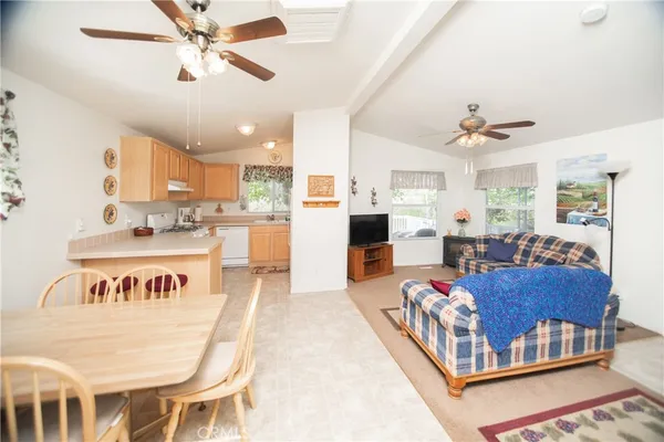 a bedroom with furniture and a chandelier