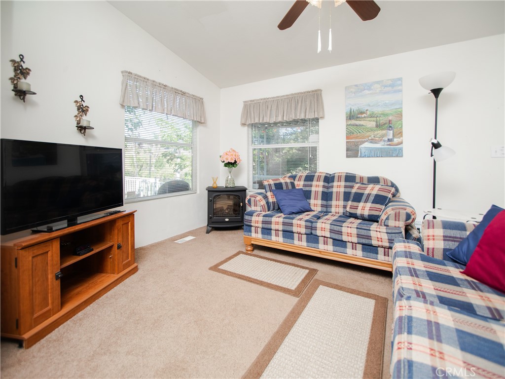 16390 Tish-A-Tang Road Lower Lake, CA 95457 - Photo 4 of 36 a living room with furniture and a flat screen tv
