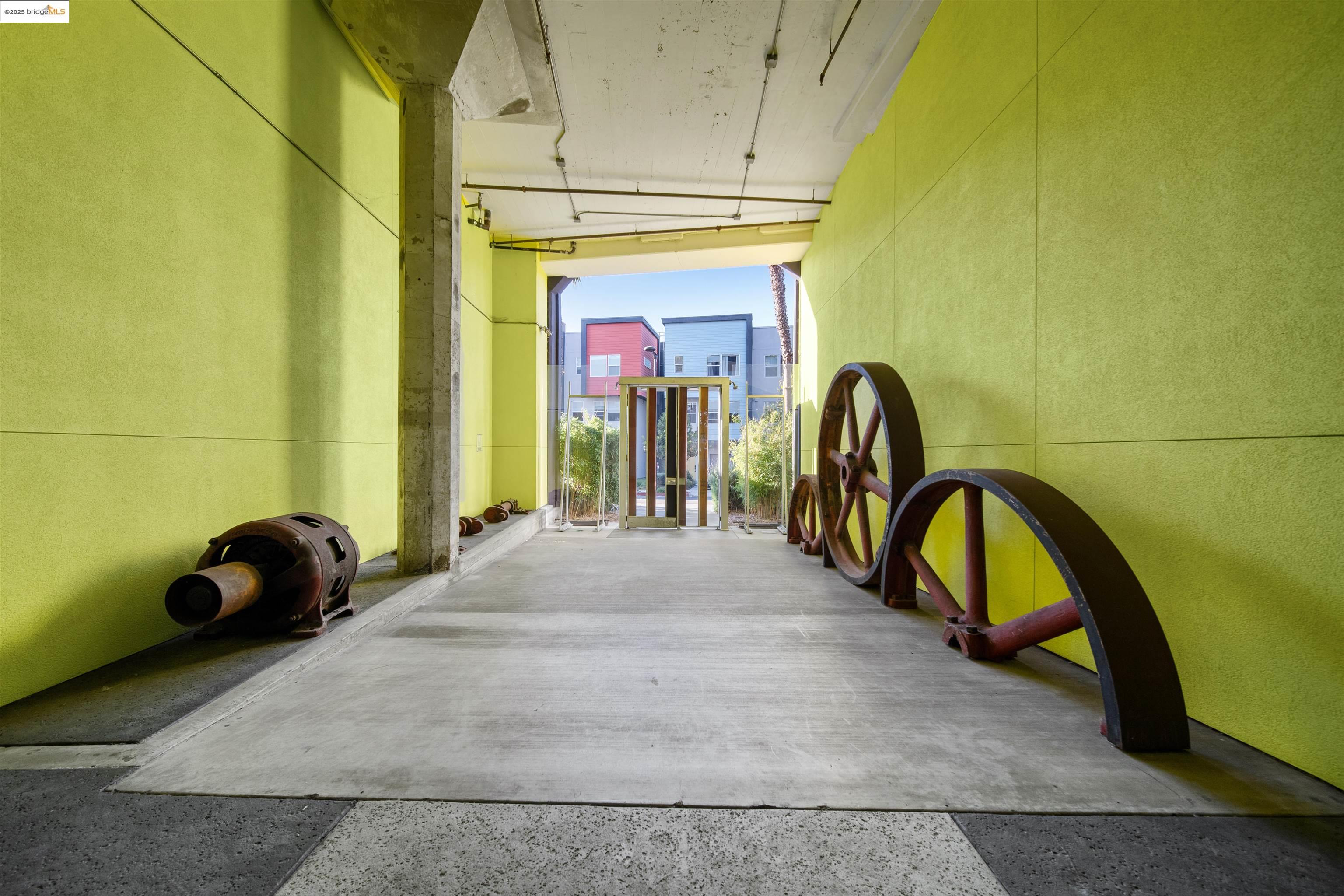 1201 Pine Street, Unit 363 Oakland, CA 94607 - Photo 13 of 25 a bedroom with a bed and a large window