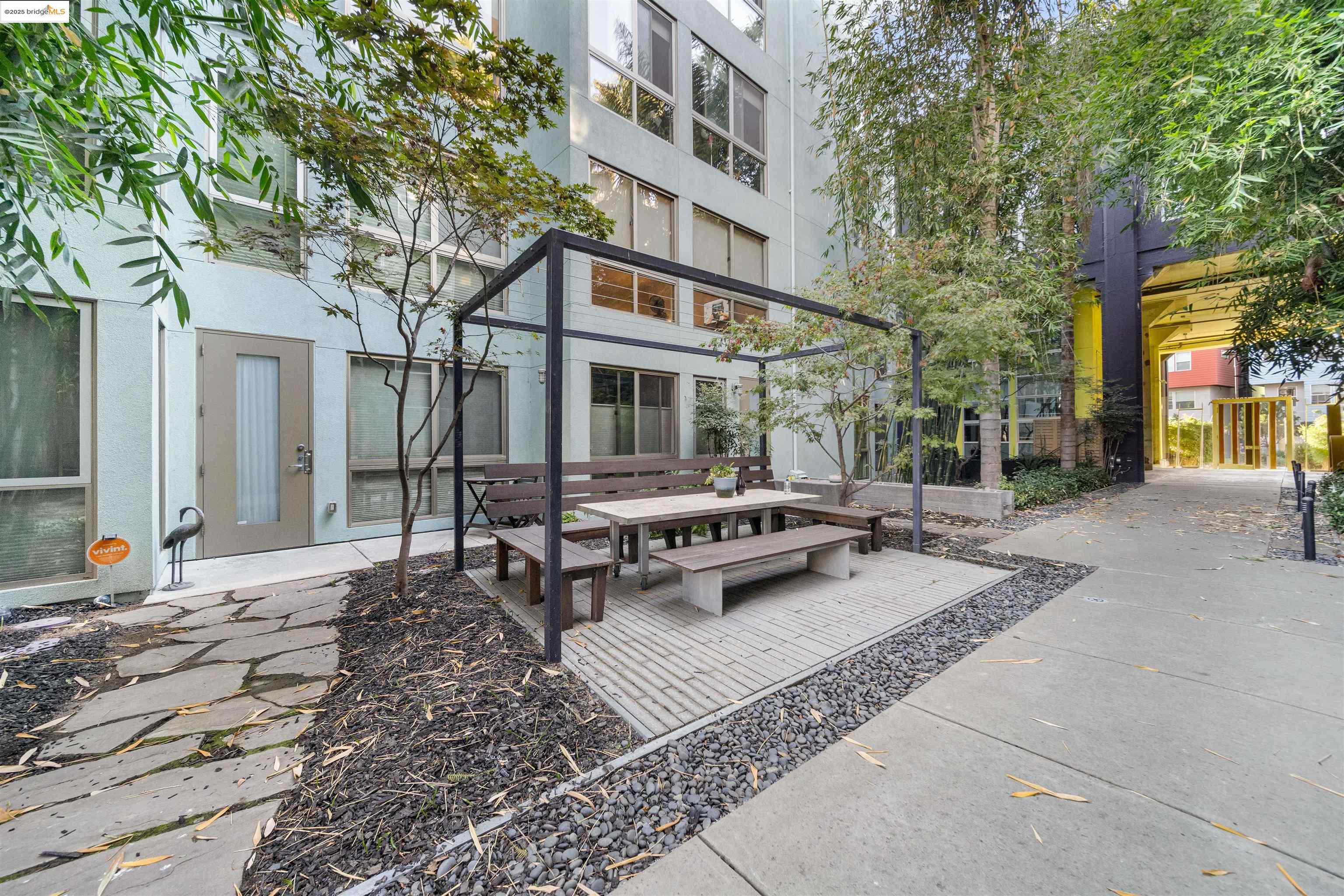 1201 Pine Street, Unit 363 Oakland, CA 94607 - Photo 22 of 25 a view of a building with sitting area