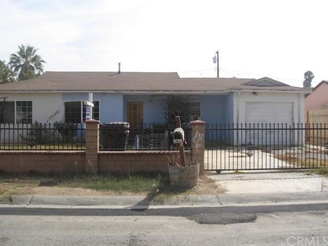 5549 Challen Avenue Riverside, CA 92503 - Photo 1 of 1 a view of a house with a small yard and plants