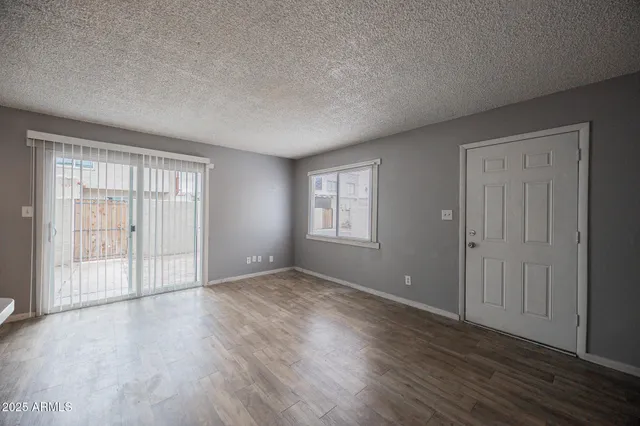 a view of a kitchen with a sink and a microwave