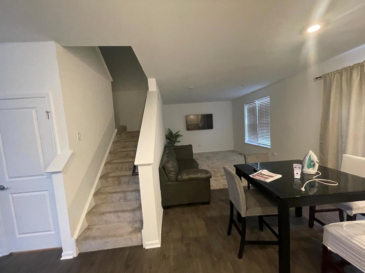 1464 Collins Street Elburn, IL 60119 - Photo 5 of 11 a living room with furniture and wooden floor