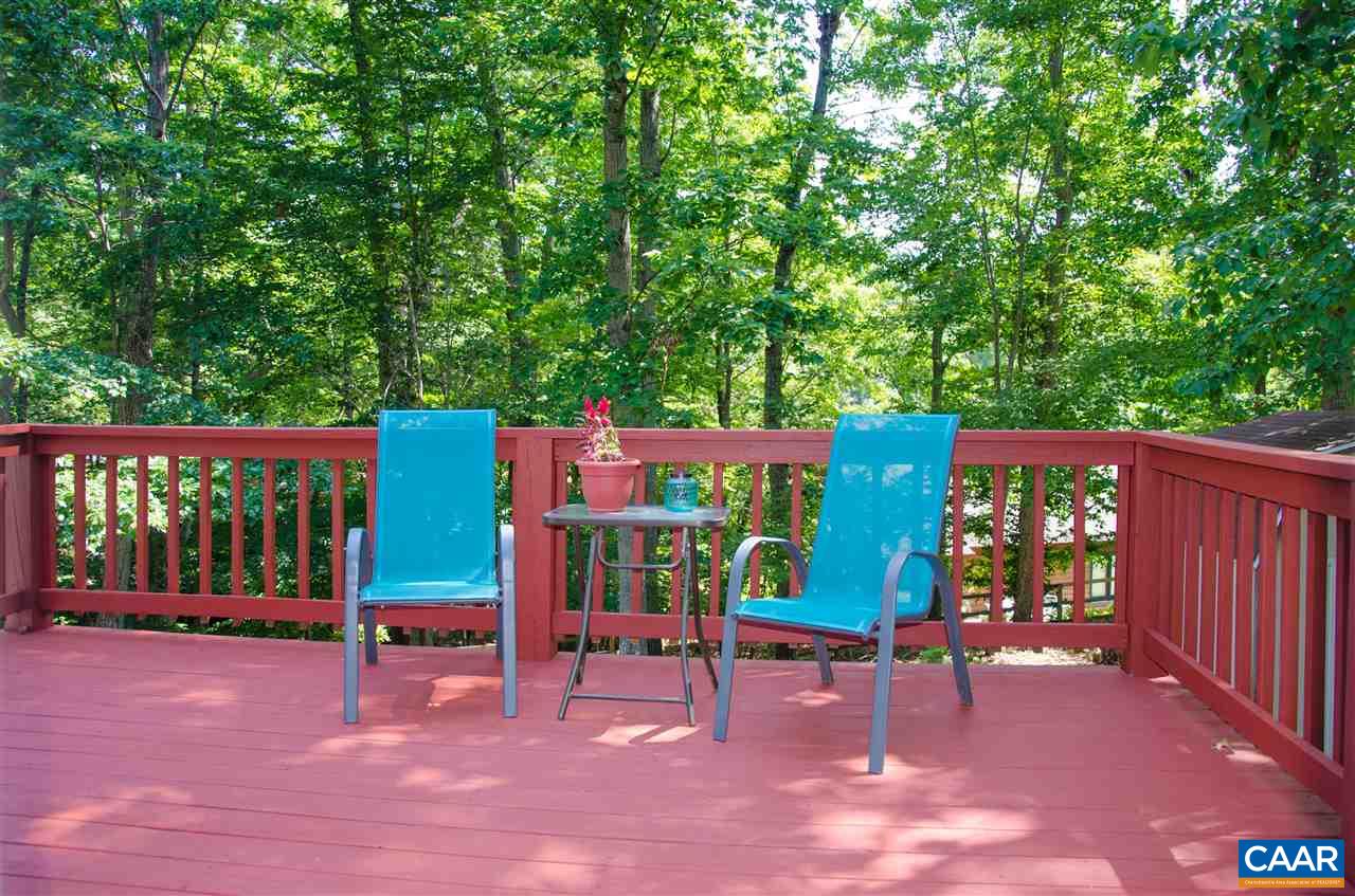 15 Ashton Road Palmyra, VA 22963 - Photo 43 of 50 a view of a chairs and tables in the back yard of the house