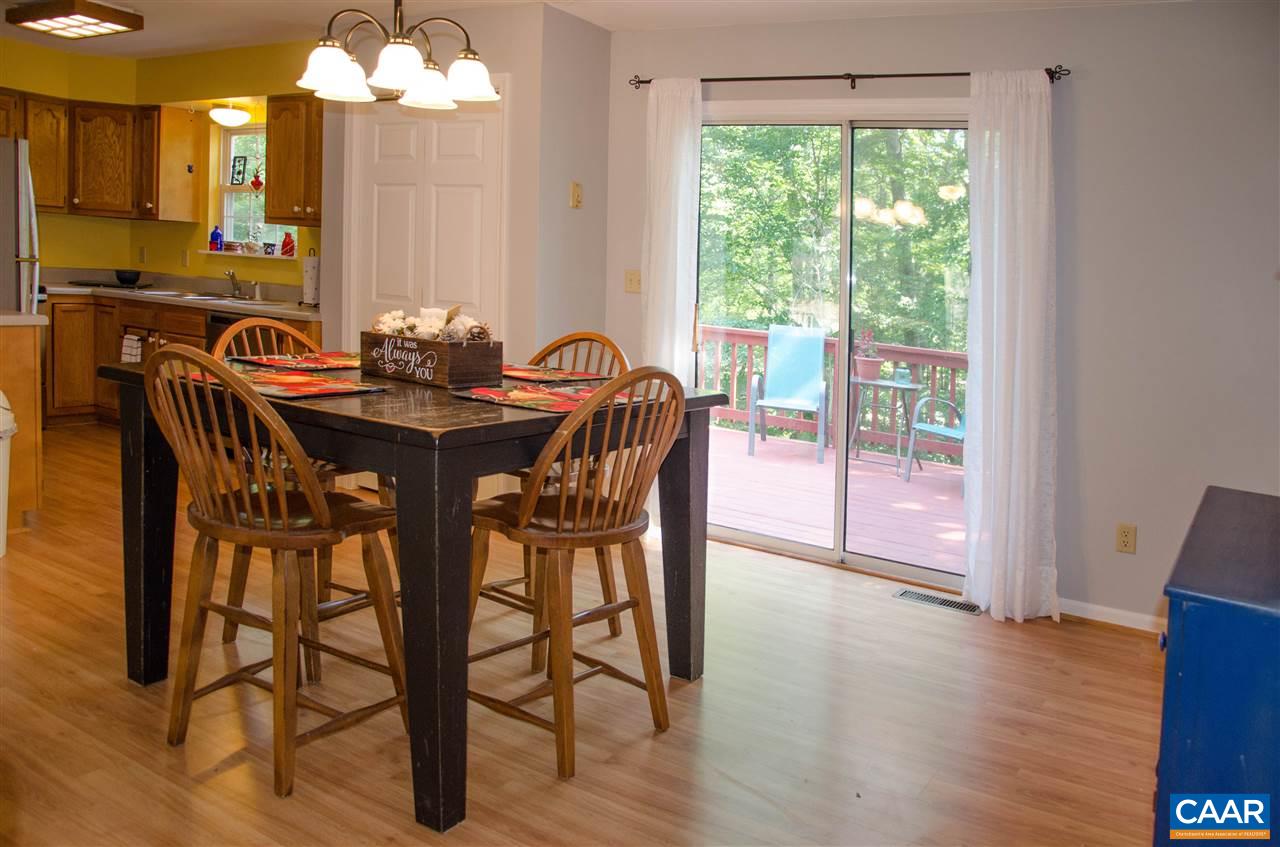 15 Ashton Road Palmyra, VA 22963 - Photo 6 of 50 a view of a a dining room with furniture window and wooden floor