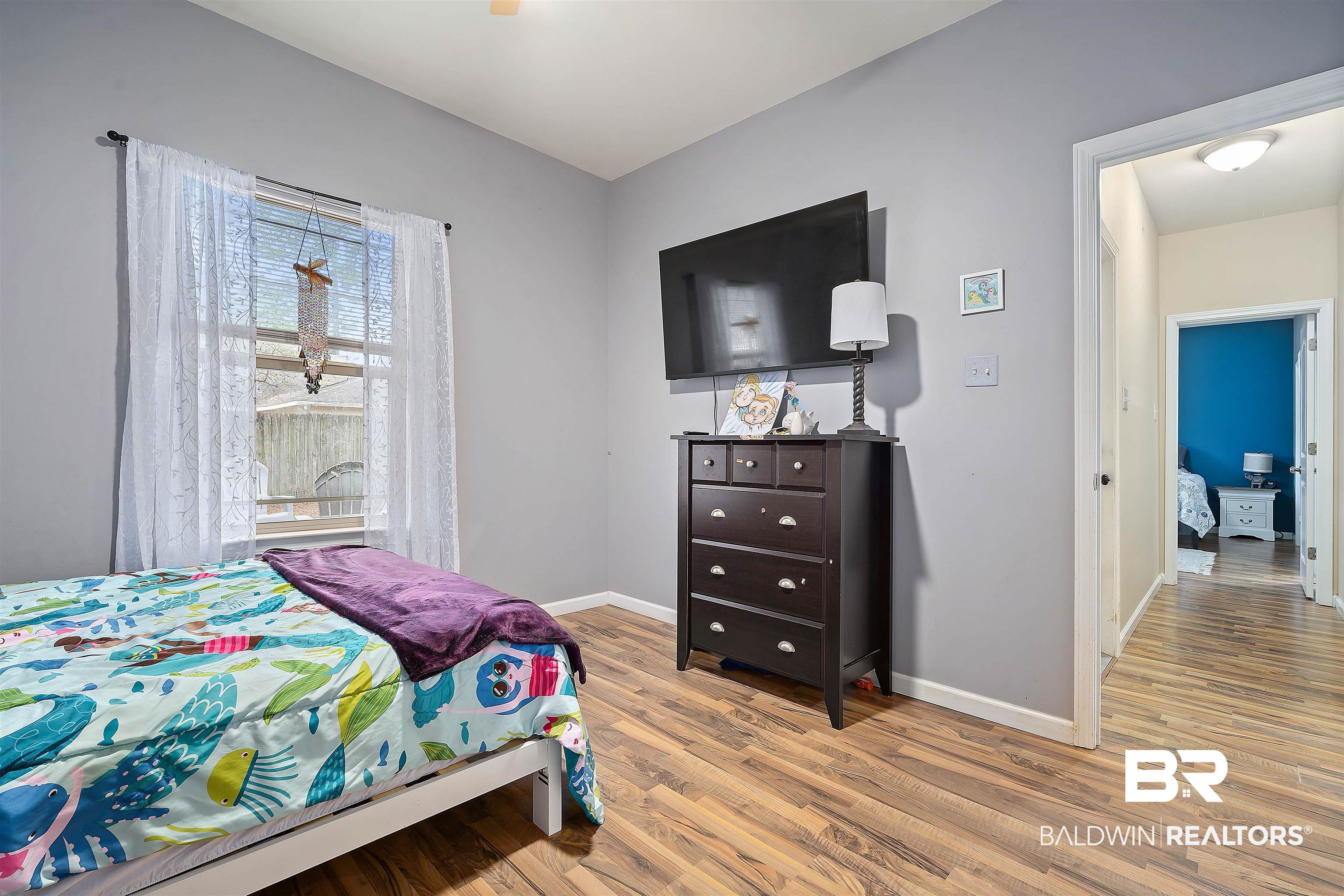 209 Maplewood Loop Daphne, AL 36526 - Photo 15 of 23 Bedroom featuring light wood-style flooring and ceiling fan