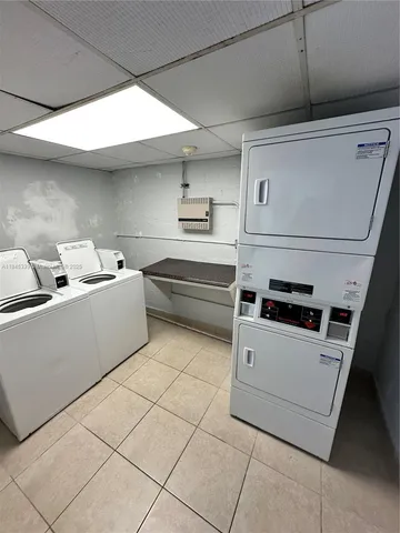 a utility room with washer and dryer