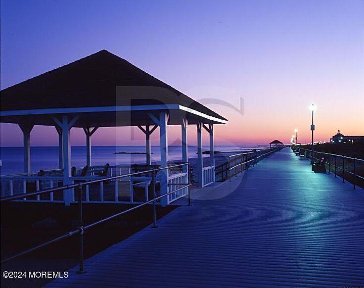 513 Mercer Avenue Spring Lake, NJ 07762 - Photo 14 of 53 a view of a roof deck with couches