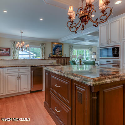 513 Mercer Avenue Spring Lake, NJ 07762 - Photo 25 of 53 a kitchen with stainless steel appliances granite countertop a stove and cabinets