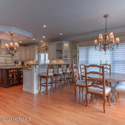 513 Mercer Avenue Spring Lake, NJ 07762 - Photo 27 of 53 a view of a dining room with furniture and wooden floor