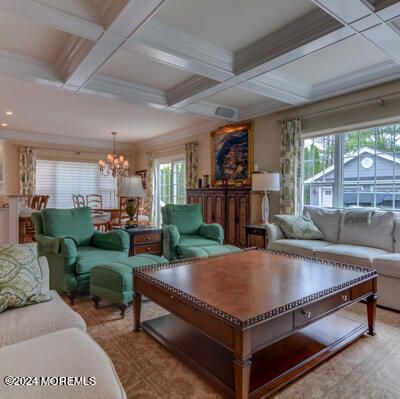 513 Mercer Avenue Spring Lake, NJ 07762 - Photo 30 of 53 a living room with furniture a flat screen tv and a large window