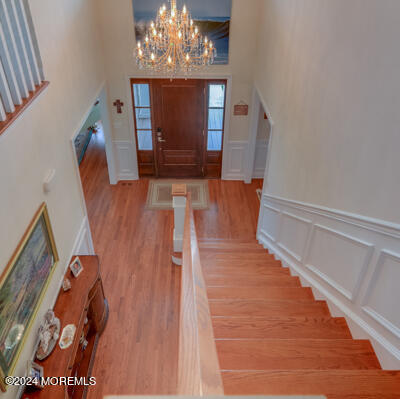 513 Mercer Avenue Spring Lake, NJ 07762 - Photo 34 of 53 a view of a living room with furniture and a chandelier