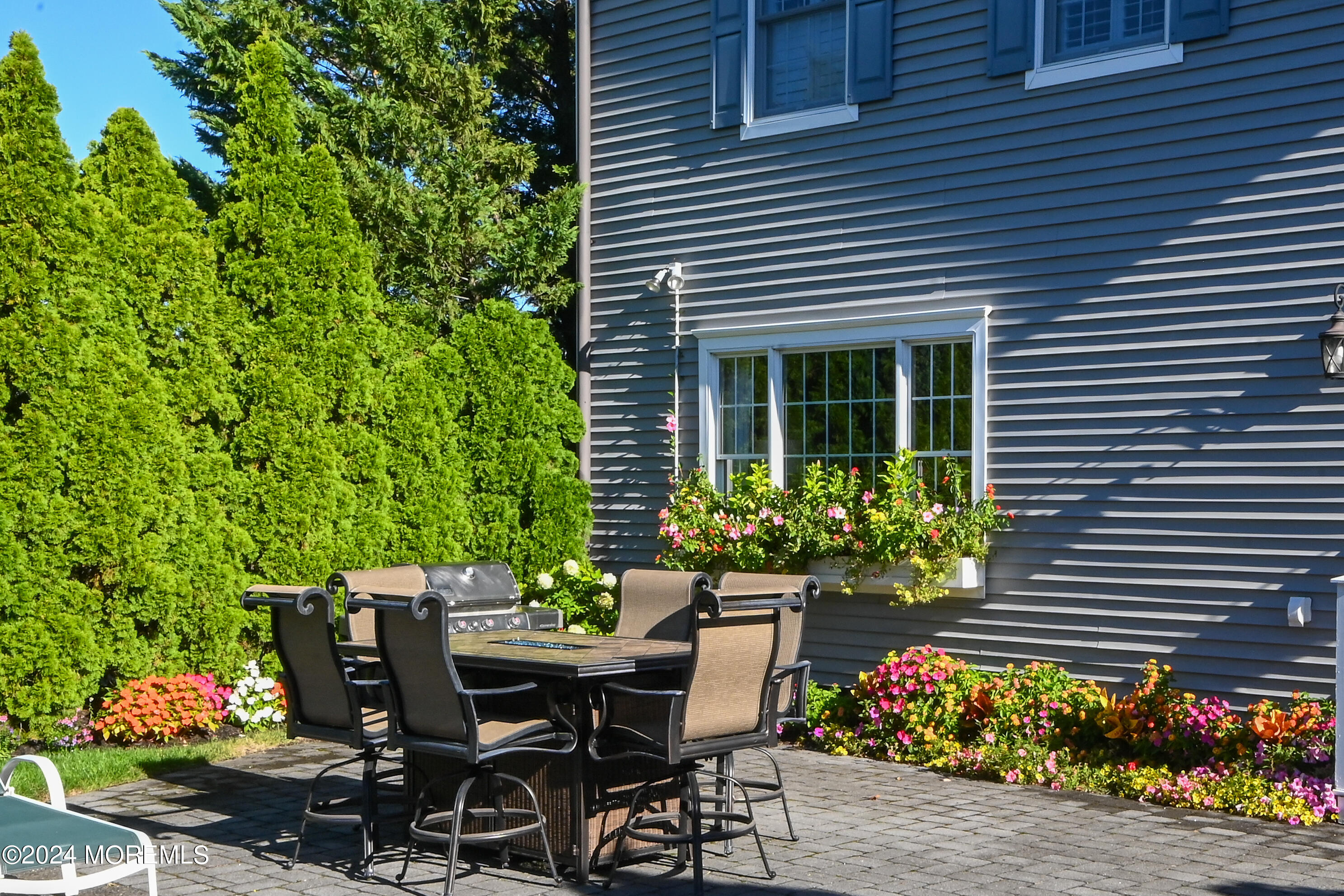 513 Mercer Avenue Spring Lake, NJ 07762 - Photo 5 of 53 a view of a house with sitting area and garden