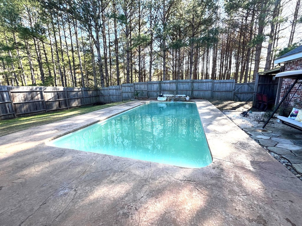 1005 Deer Ridge Road McComb, MS 39648 - Photo 30 of 36 Pool with privacy fencing