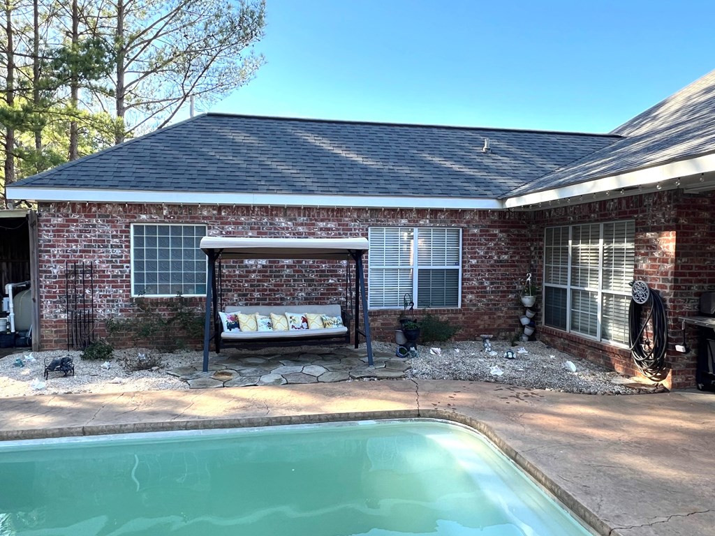 1005 Deer Ridge Road McComb, MS 39648 - Photo 32 of 36 Sitting area beside pool