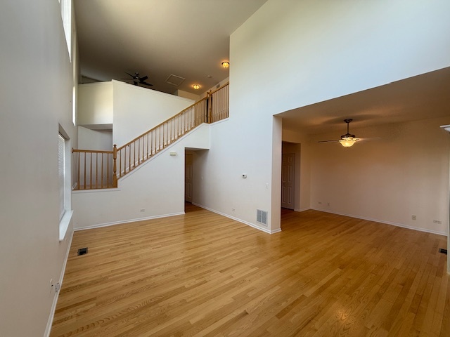 272 Bay Drive Itasca, IL 60143 - Photo 12 of 49 a view of an empty room with wooden floor
