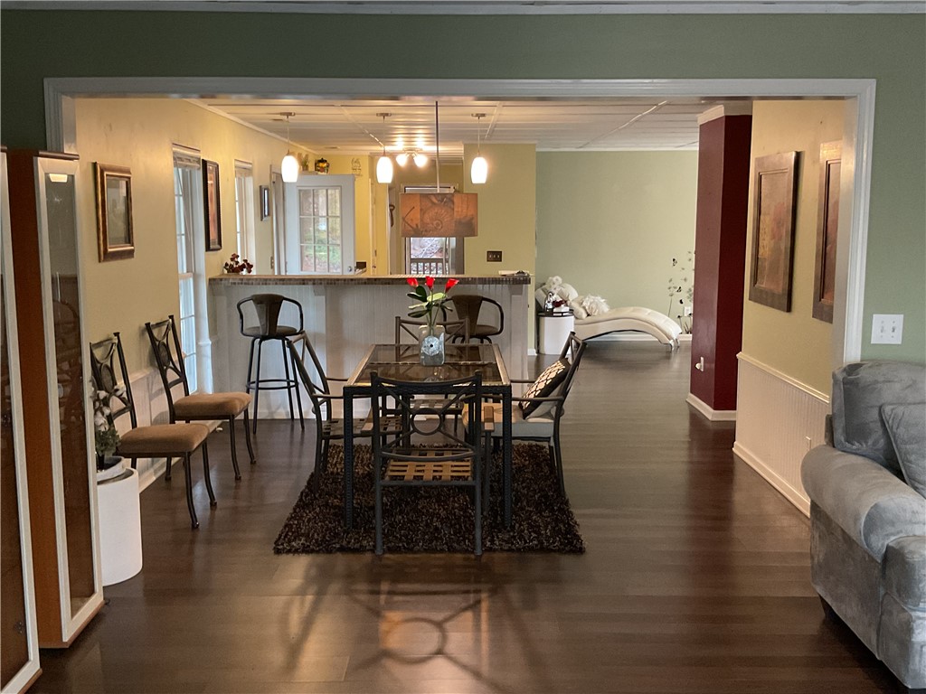 229 Cub Cove Drive Walhalla, SC 29691 - Photo 9 of 50 This inviting space features an open layout and gleaming hardwood floors.