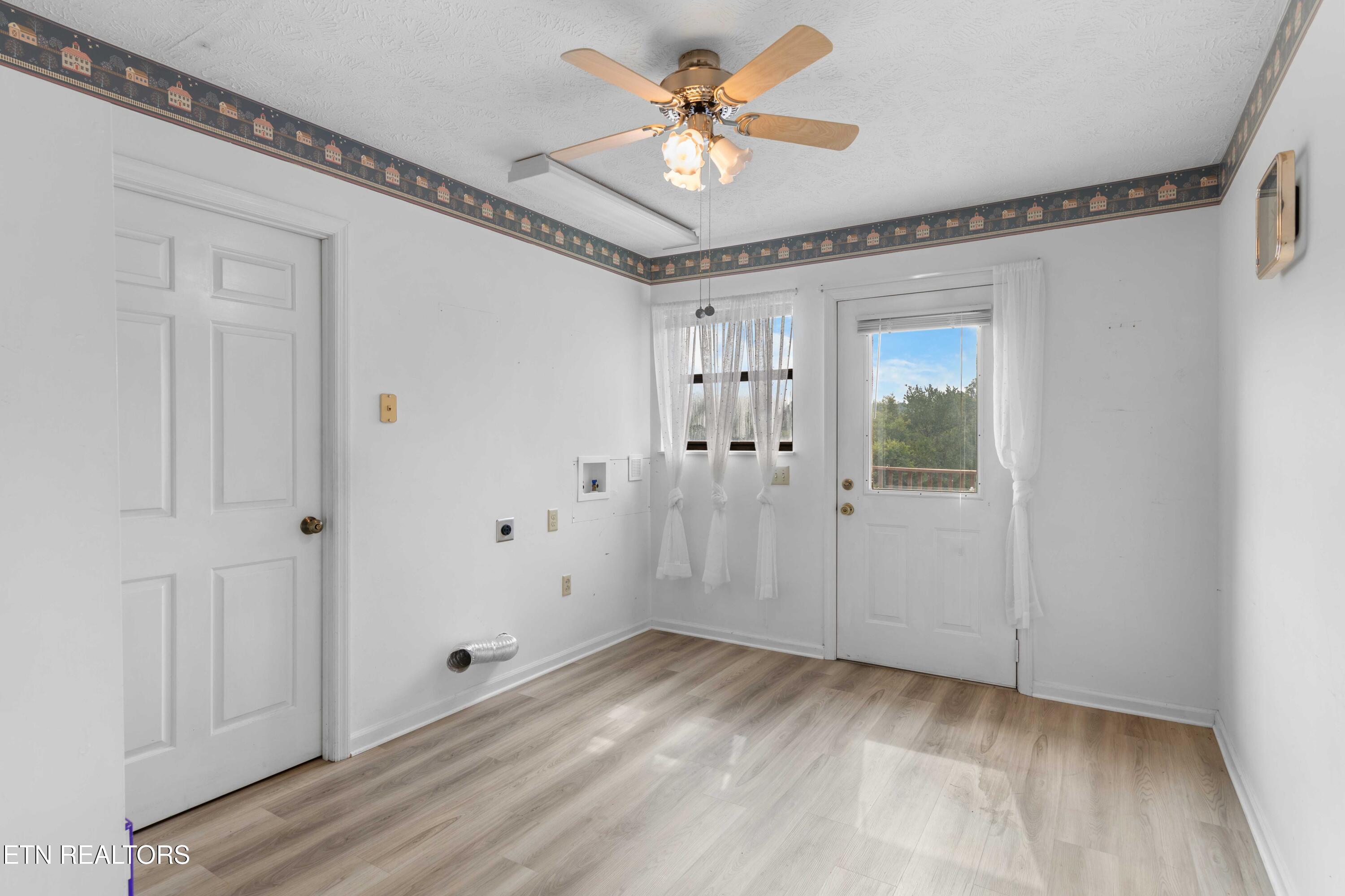3911 Miser Station Road Louisville, TN 37777 - Photo 8 of 49 Large Laundry & Utility Room