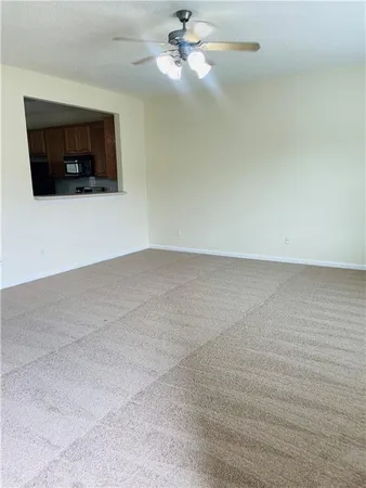 a kitchen with a stove and a refrigerator