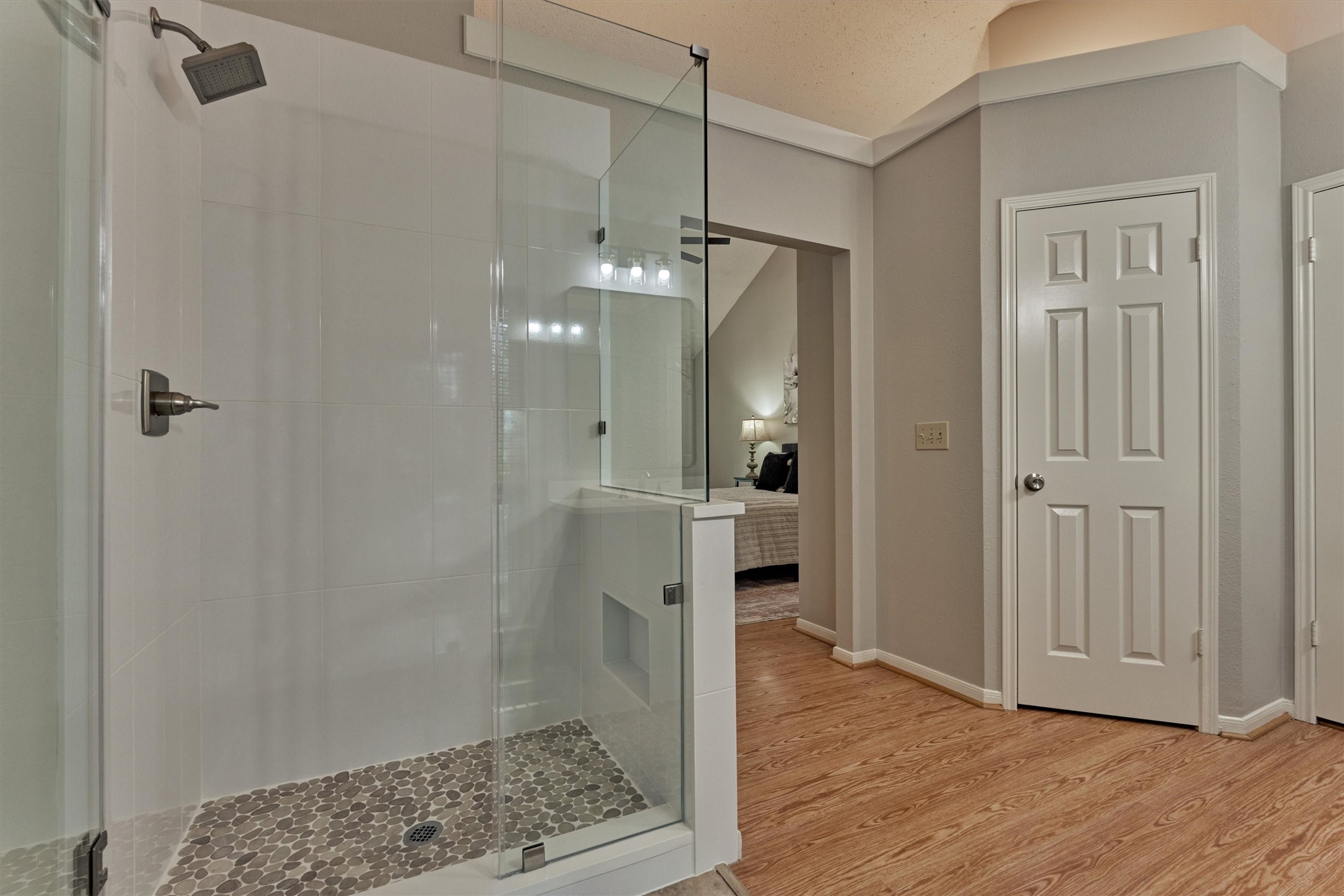 71 Breezy Point Place Spring, TX 77381 - Photo 28 of 40 Primary Bath frameless shower with spa-like pebble shower floor.