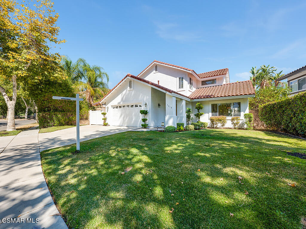 5218 Indian Hills Drive Simi Valley, CA 93063 - Photo 2 of 44 a house view with a garden space