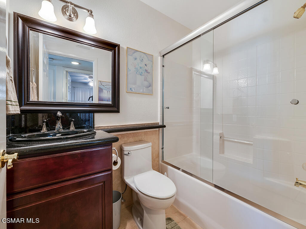 5218 Indian Hills Drive Simi Valley, CA 93063 - Photo 34 of 44 a bathroom with a toilet sink and mirror