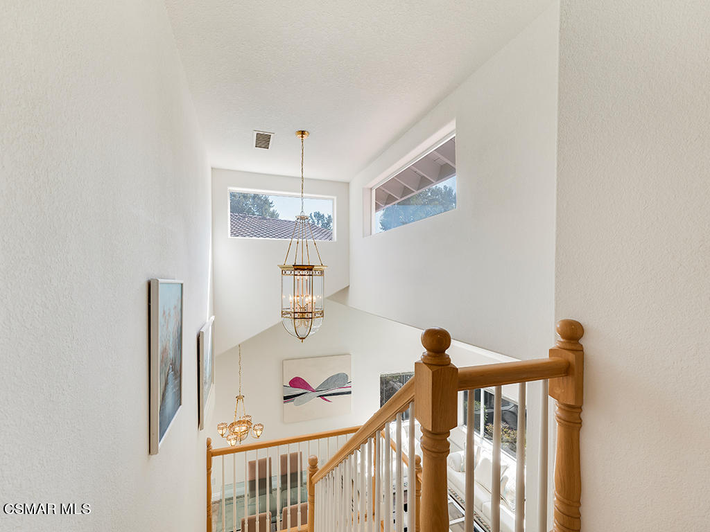 5218 Indian Hills Drive Simi Valley, CA 93063 - Photo 36 of 44 a view of a baby crib with furniture