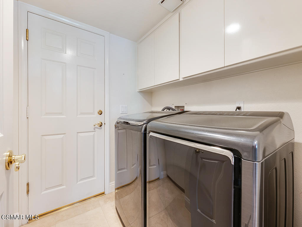 5218 Indian Hills Drive Simi Valley, CA 93063 - Photo 37 of 44 a utility room with dryer and washer